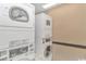 White stacked washer and dryer units offer convenient laundry solutions at 2801 S Ocean Blvd. # 339, North Myrtle Beach, SC 29582