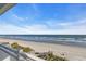 Expansive beach and ocean view from a private balcony with white railing at 2808 N Ocean Blvd., North Myrtle Beach, SC 29582