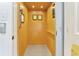 A private home elevator with wood paneled walls, lighting, call buttons, and safety equipment at 2808 N Ocean Blvd., North Myrtle Beach, SC 29582