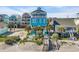 Bright beach house with multiple balconies and walkways to the beach with lots of stairs at 2808 N Ocean Blvd., North Myrtle Beach, SC 29582