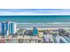 Stunning oceanfront property with vibrant blue exterior and panoramic beach views at 2808 N Ocean Blvd., North Myrtle Beach, SC 29582