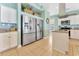 Kitchen with stainless steel appliances, island, and décor accents at 2808 N Ocean Blvd., North Myrtle Beach, SC 29582