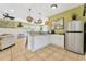 Well-equipped kitchenette with white cabinets and stainless steel refrigerator at 2808 N Ocean Blvd., North Myrtle Beach, SC 29582