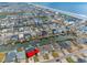 Stunning aerial view showcasing the coastal neighborhood and canal access to the ocean at 314 45Th Ave. N, North Myrtle Beach, SC 29582