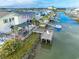 Waterfront backyard featuring a covered pavilion, dock, boardwalk, and serene water views at 314 45Th Ave. N, North Myrtle Beach, SC 29582