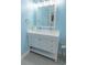 Bathroom featuring a modern double sink vanity with ample storage, a large mirror and fixtures at 314 45Th Ave. N, North Myrtle Beach, SC 29582