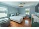 Charming bedroom with two twin beds, light blue walls, and hardwood floors at 314 45Th Ave. N, North Myrtle Beach, SC 29582