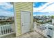 Home with water view from a deck area with a door to the outside at 314 45Th Ave. N, North Myrtle Beach, SC 29582