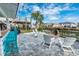 Outdoor patio with fire pit, Adirondack chairs, bar and views of the canal at 314 45Th Ave. N, North Myrtle Beach, SC 29582