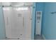 Modern tiled walk-in shower with clear glass doors and upgraded shower head and hardware at 314 45Th Ave. N, North Myrtle Beach, SC 29582