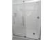 Modern shower featuring glass door, white subway tiles, and sleek fixtures at 314 45Th Ave. N, North Myrtle Beach, SC 29582