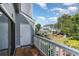 Cozy balcony with garden views, perfect for outdoor relaxing and enjoying the scenery at 3700 Golf Colony Lane # 21 B, Little River, SC 29566