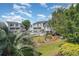 Attractive condos in a lush setting with mature trees and landscaping around community pool at 3700 Golf Colony Lane # 21 B, Little River, SC 29566