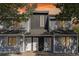 Charming townhouse exterior with gray siding, white doors, and manicured landscaping at 3700 Golf Colony Lane # 21 B, Little River, SC 29566