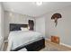 Comfortable bedroom featuring wood-look floors, neutral tones, and abundant natural light from the windows at 3934 North Fraser St., Georgetown, SC 29440