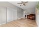 Spacious bedroom offers a closet, en-suite, wood-look flooring, and room for a crib at 3934 North Fraser St., Georgetown, SC 29440