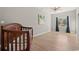 Bright bedroom with a ceiling fan, wood-look flooring, and natural light from the window at 3934 North Fraser St., Georgetown, SC 29440