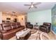 Cozy living room with plush seating, a unique coffee table, and a view into the adjacent modern kitchen at 40 Parkside Dr., Pawleys Island, SC 29585