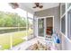 This screened porch overlooks a scenic lake at 40 Parkside Dr., Pawleys Island, SC 29585