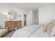 Comfortable bedroom with a decorative mirror, dresser, and inviting color palette at 400 Rookroost Circle, Conway, SC 29526