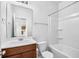 Clean bathroom featuring a vanity, toilet, and a shower-tub combo at 4009 Alvina Way, Myrtle Beach, SC 29579