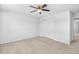 A bedroom featuring carpet, ceiling fan, and a closet with sliding doors at 4009 Alvina Way, Myrtle Beach, SC 29579