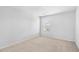 Bedroom with neutral carpet, a window, and clean white walls at 4009 Alvina Way, Myrtle Beach, SC 29579