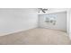 Bright bedroom featuring a window view, neutral carpet, and white walls at 4009 Alvina Way, Myrtle Beach, SC 29579