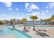 Community lazy river, palm trees, and lounge chairs by the lake offering a serene retreat at 4009 Alvina Way, Myrtle Beach, SC 29579