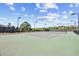 Community tennis court with lighting providing residents a place to enjoy a friendly tennis match at 4009 Alvina Way, Myrtle Beach, SC 29579