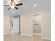 Primary bedroom with wood flooring, recessed lighting, and en-suite access at 409 14Th Ave. S, North Myrtle Beach, SC 29582