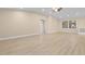 Bright living room boasts wood floors, recessed lighting and neutral paint scheme at 409 14Th Ave. S, North Myrtle Beach, SC 29582