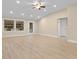 Bright living room boasts wood floors, recessed lighting and neutral paint scheme at 409 14Th Ave. S, North Myrtle Beach, SC 29582