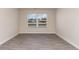 Bedroom featuring a large window providing natural light and wood-look flooring at 411 Acosta Circle, Conway, SC 29527