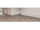 Spacious living room with hardwood flooring and view of kitchen area, perfect for entertaining and gatherings at 411 Acosta Circle, Conway, SC 29527