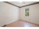 Bright bedroom with modern flooring, neutral walls, and a large window, creating a comfortable retreat at 4300 Cross Cut Trail, Myrtle Beach, SC 29579