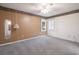 Spacious primary bedroom with neutral tones, plush carpeting, and bright windows creating a relaxing retreat at 4300 Cross Cut Trail, Myrtle Beach, SC 29579