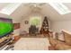 Bright bonus room with skylights, desk, and TV; perfect for recreation at 4535 Carriage Run Circle, Murrells Inlet, SC 29576