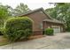 Charming brick home with well-manicured landscaping and a two-car garage at 4535 Carriage Run Circle, Murrells Inlet, SC 29576