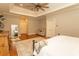 Large main bedroom featuring tray ceilings, hardwood floors, and sitting area at 4535 Carriage Run Circle, Murrells Inlet, SC 29576