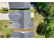 Aerial view of gray roof, lush lawn and landscaping of home's exterior at 4591 Hidden Creek Ln., Myrtle Beach, SC 29579