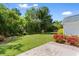 Spacious backyard with green grass and mature trees, ideal for outdoor activities and relaxation at 4591 Hidden Creek Ln., Myrtle Beach, SC 29579