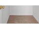 Small, carpeted walk-in closet with white trim at 4591 Hidden Creek Ln., Myrtle Beach, SC 29579