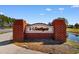 Welcome to Southgate, a residential neighborhood distinguished by its brick entrance and well-manicured pond at 4591 Hidden Creek Ln., Myrtle Beach, SC 29579