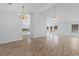 Open-concept living area features hardwood floors, vaulted ceilings, and flows into the kitchen at 4591 Hidden Creek Ln., Myrtle Beach, SC 29579