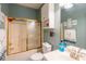 Bathroom with shower/tub combo and tiled walls at 4741 Wild Iris Dr. # 303, Myrtle Beach, SC 29577