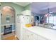 Open kitchen with a breakfast bar overlooking the living area and bright decor at 4741 Wild Iris Dr. # 303, Myrtle Beach, SC 29577