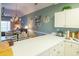 Stylish kitchen with a breakfast bar that opens to a comfortable living area at 4741 Wild Iris Dr. # 303, Myrtle Beach, SC 29577