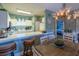 Charming kitchen with bar seating that opens to the dining and bedroom at 4741 Wild Iris Dr. # 303, Myrtle Beach, SC 29577