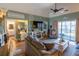 Comfortable living room with stylish furniture, a fireplace, and a sliding door at 4741 Wild Iris Dr. # 303, Myrtle Beach, SC 29577